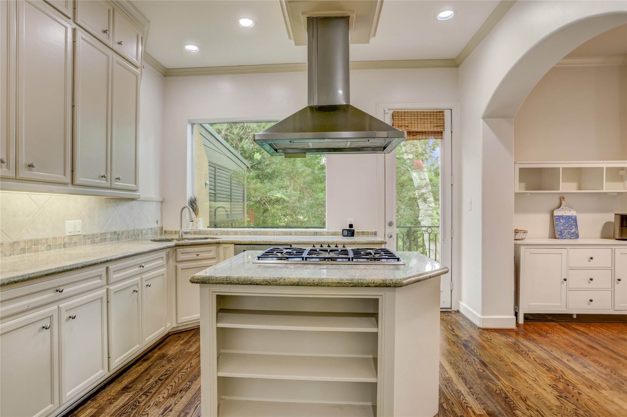 4262 Childress Street, Unit B Houston, TX 77005 - Photo 10 of 22 a kitchen with a stove and a sink