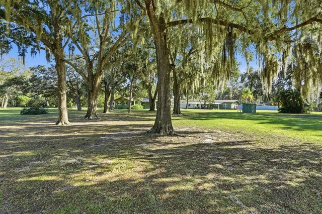 a large kitchen with stainless steel appliances granite countertop a sink counter space and stainless steel appliances