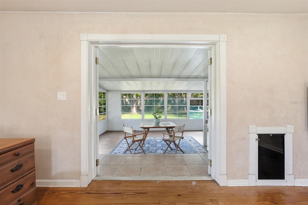 191 Howes Street Oak Hill, FL 32759 - Photo 20 of 98 a living room with furniture and a window