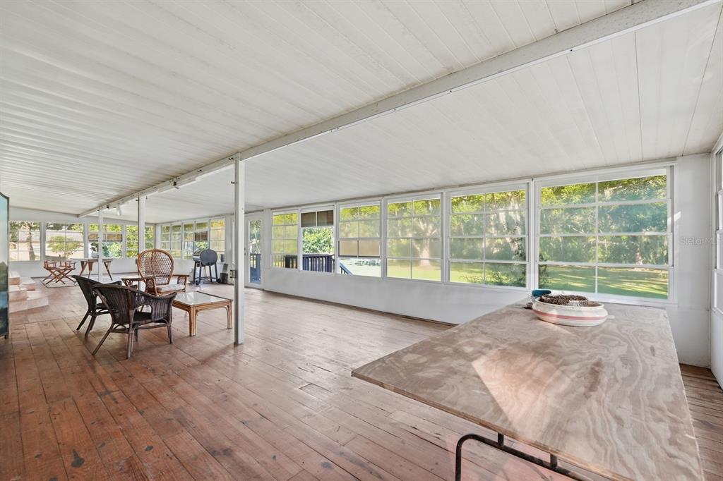 191 Howes Street Oak Hill, FL 32759 - Photo 44 of 98 a view of a dining room with furniture window and outside view