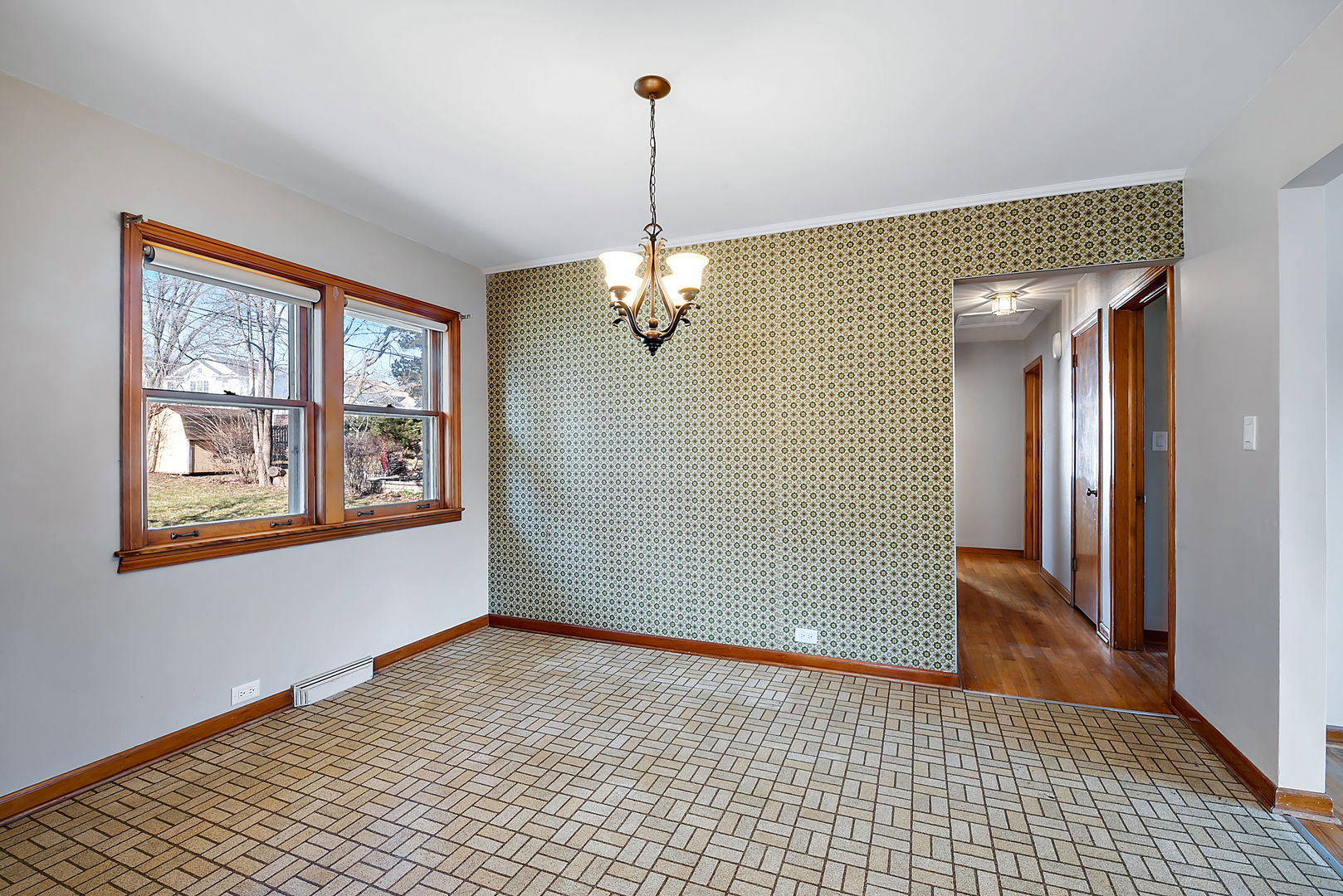 256 North Jackson Road Clarendon Hills, IL 60514 - Photo 12 of 30 a view of a room with window and wooden floor