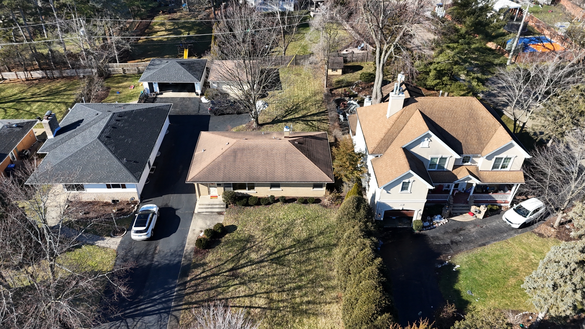256 North Jackson Road Clarendon Hills, IL 60514 - Photo 23 of 30 an aerial view of multiple houses with yard
