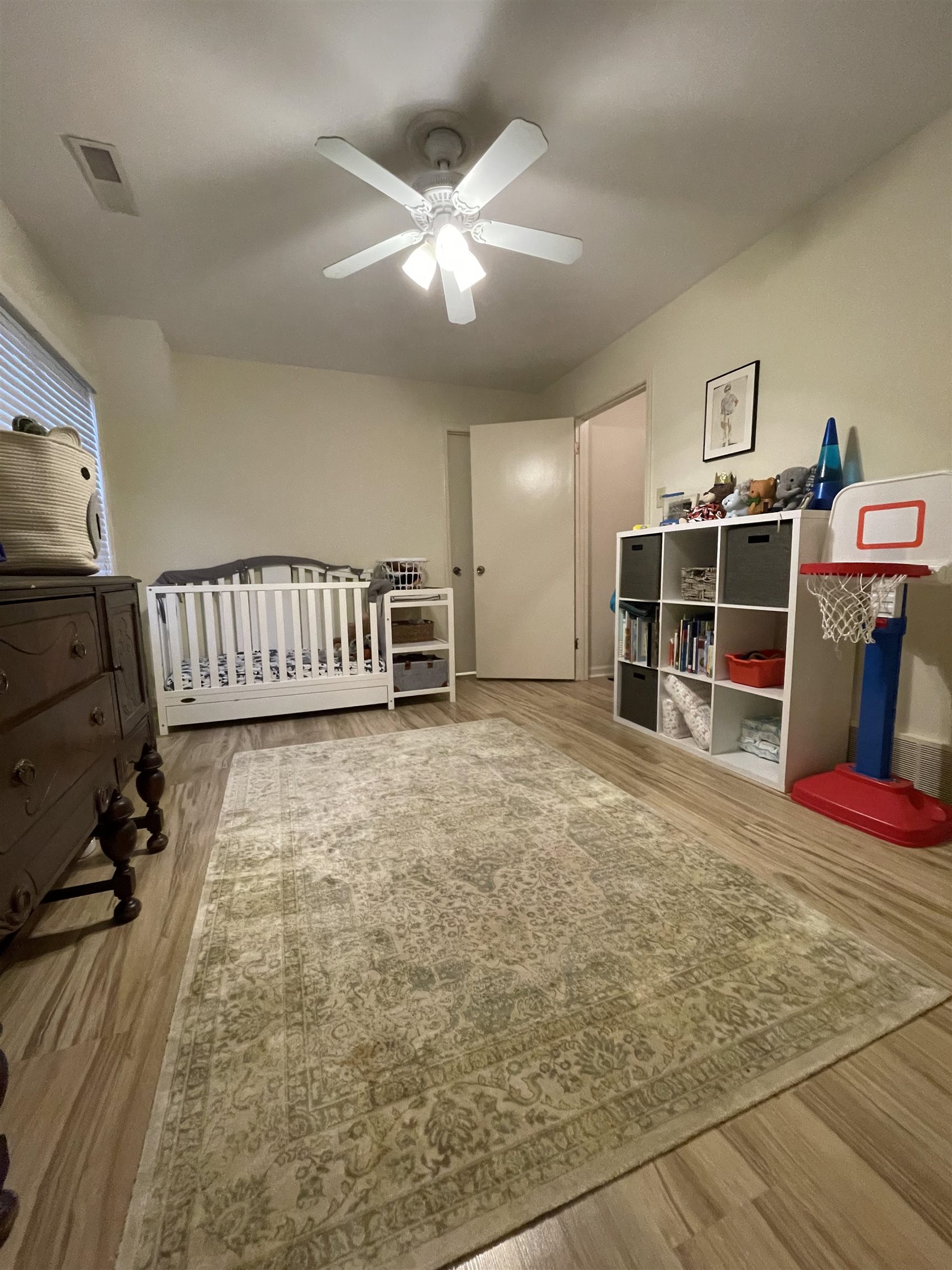 363 South Fenwick Road Memphis, TN 38111 - Photo 14 of 19 a view of a livingroom with furniture and a flat screen tv