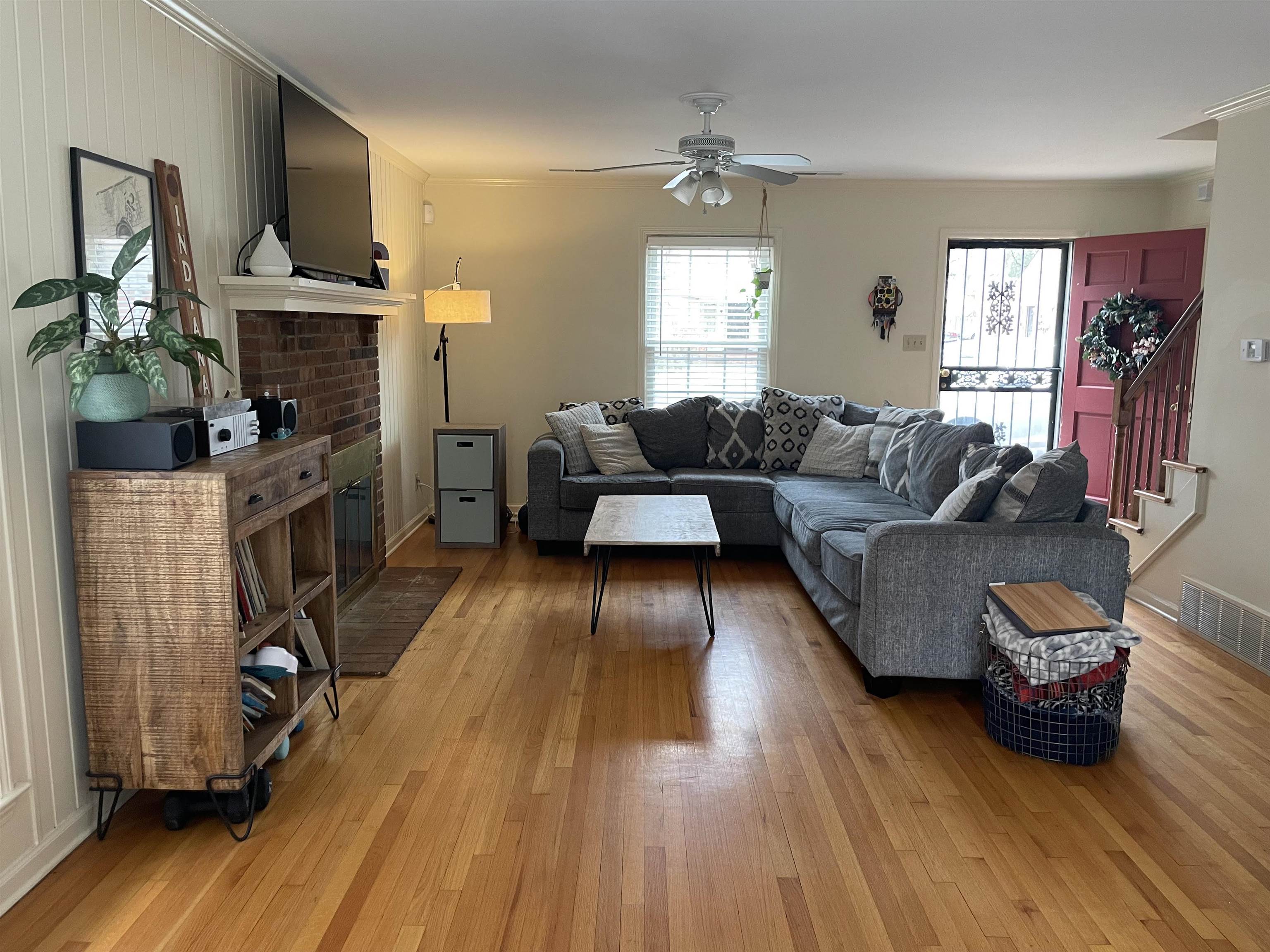 363 South Fenwick Road Memphis, TN 38111 - Photo 4 of 19 a living room with furniture and a fireplace