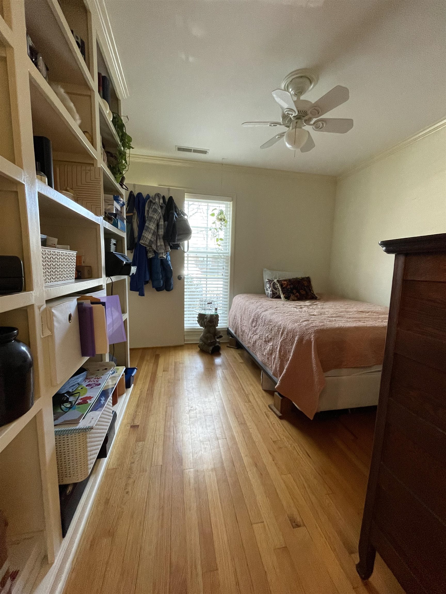 363 South Fenwick Road Memphis, TN 38111 - Photo 10 of 19 a bedroom with a bed and a walk in closet