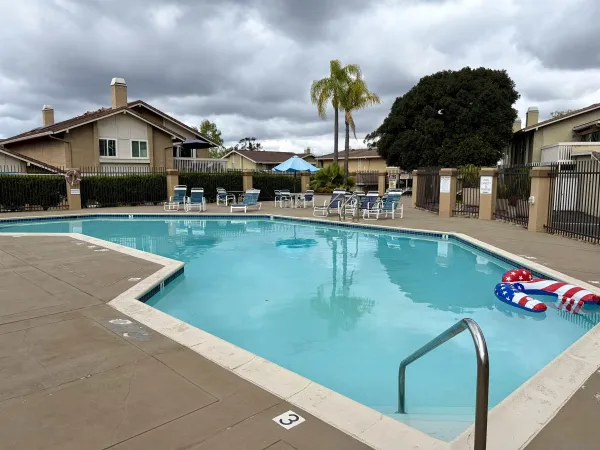 a view of a house with a swimming pool