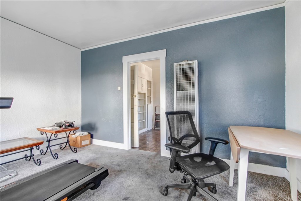 523 Lincoln Avenue Pasadena, CA 91103 - Photo 18 of 24 a living room with furniture and a window