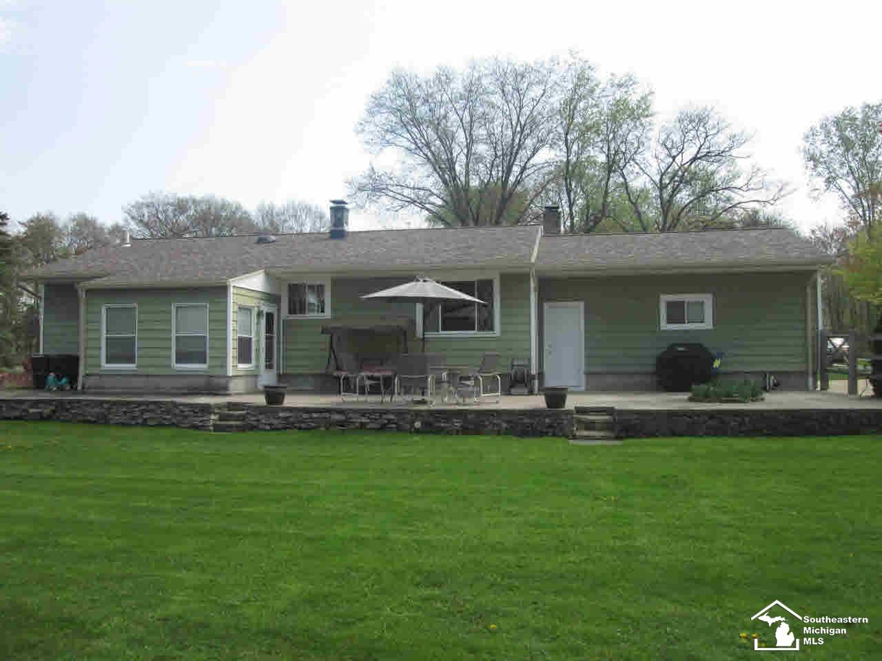 8829 Crabb Road Temperance, MI 48182 - Photo 3 of 25 Rear of House
