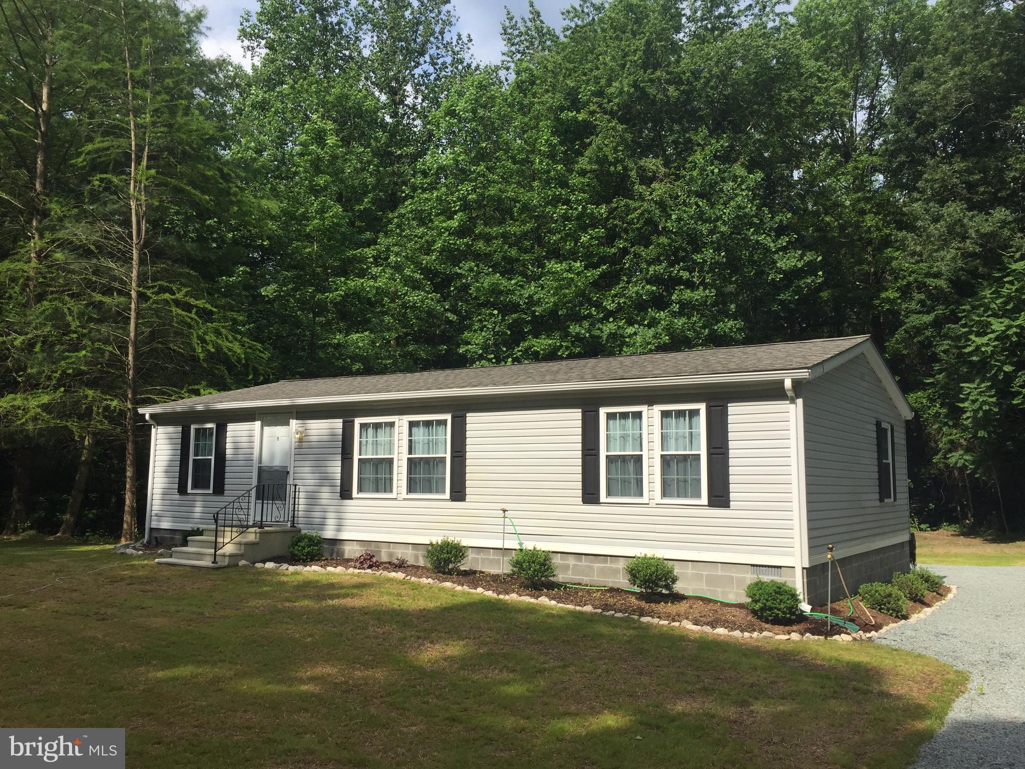 6594 Laurel Grove Road Denton, MD 21629 - Photo 1 of 17 A Private Setting Surrounded By Woods