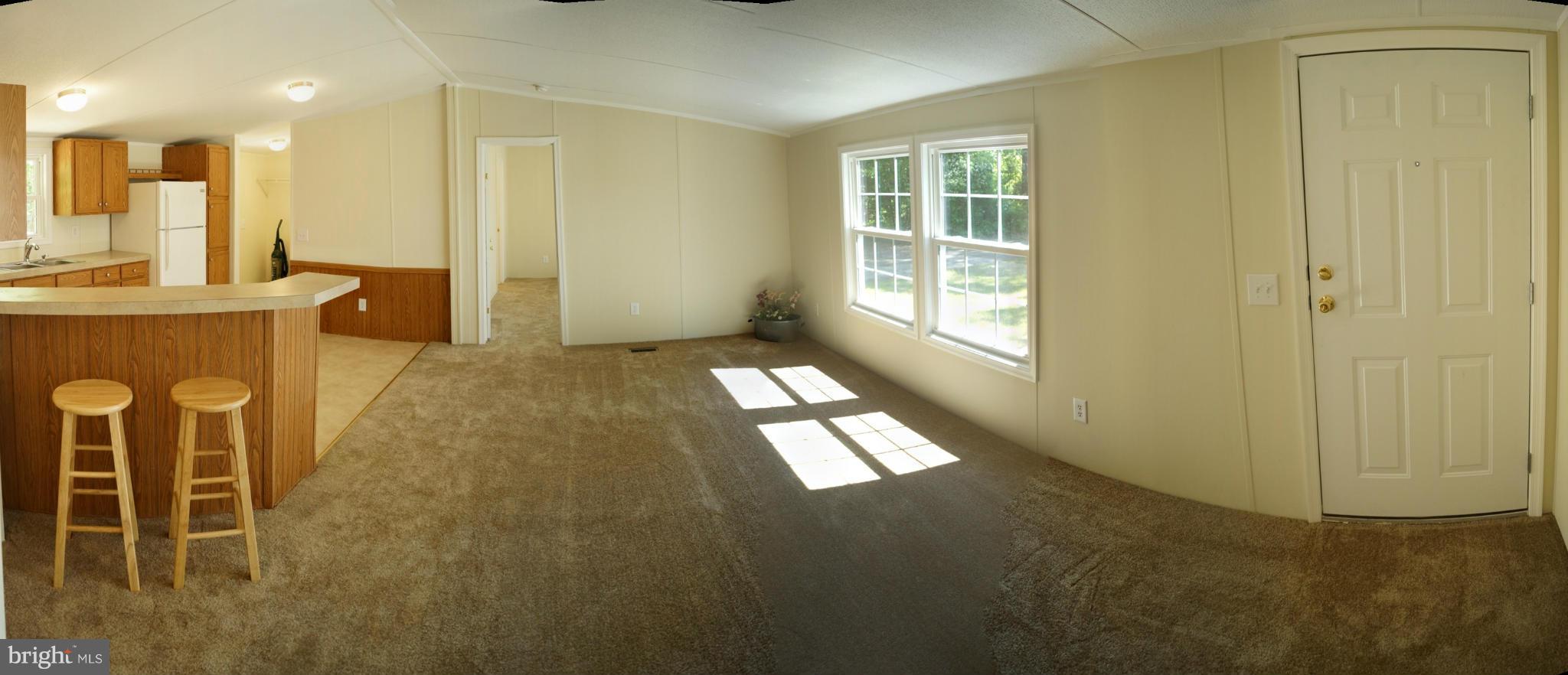 6594 Laurel Grove Road Denton, MD 21629 - Photo 5 of 17 Living Room Open to Kitchen