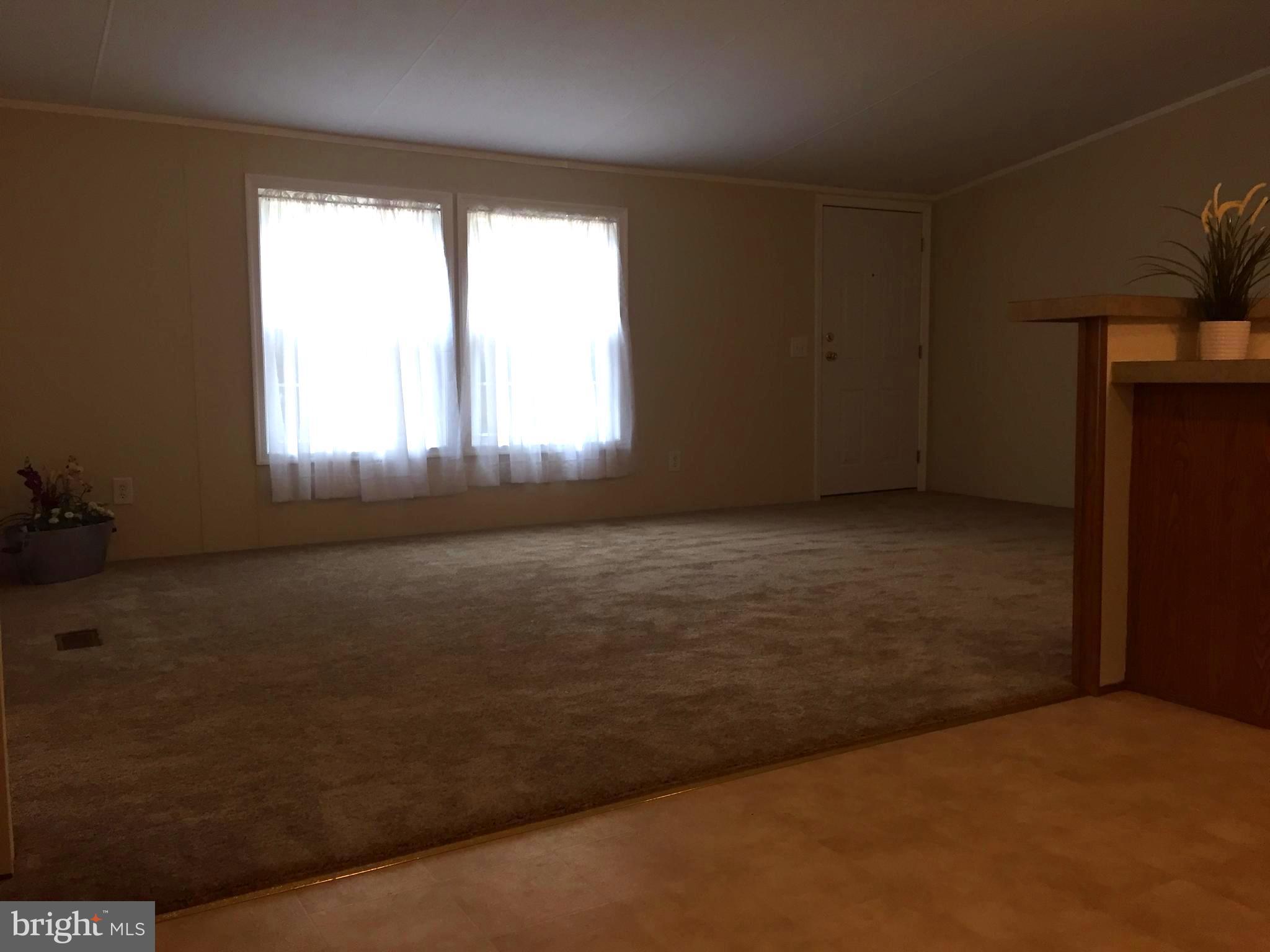 6594 Laurel Grove Road Denton, MD 21629 - Photo 7 of 17 View to Living Room from Kitchen
