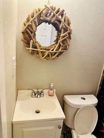 a bathroom with a sink and mirror