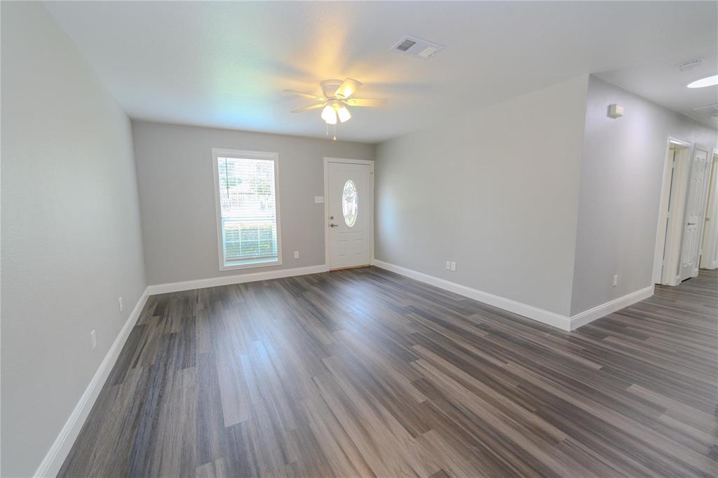 809 Wilcox Street McKinney, TX 75069 - Photo 3 of 26 Foyer featuring ceiling fan and dark wood-style flooring