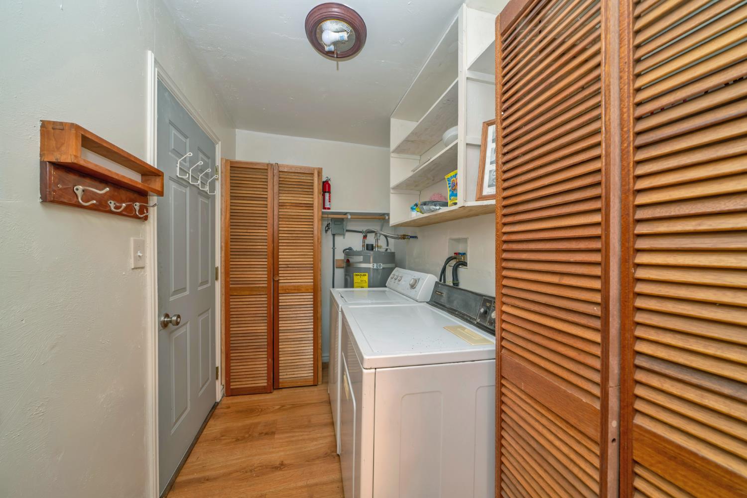 1334 School Road Kyburz, CA 95720 - Photo 13 of 36 a utility room with dryer and washer