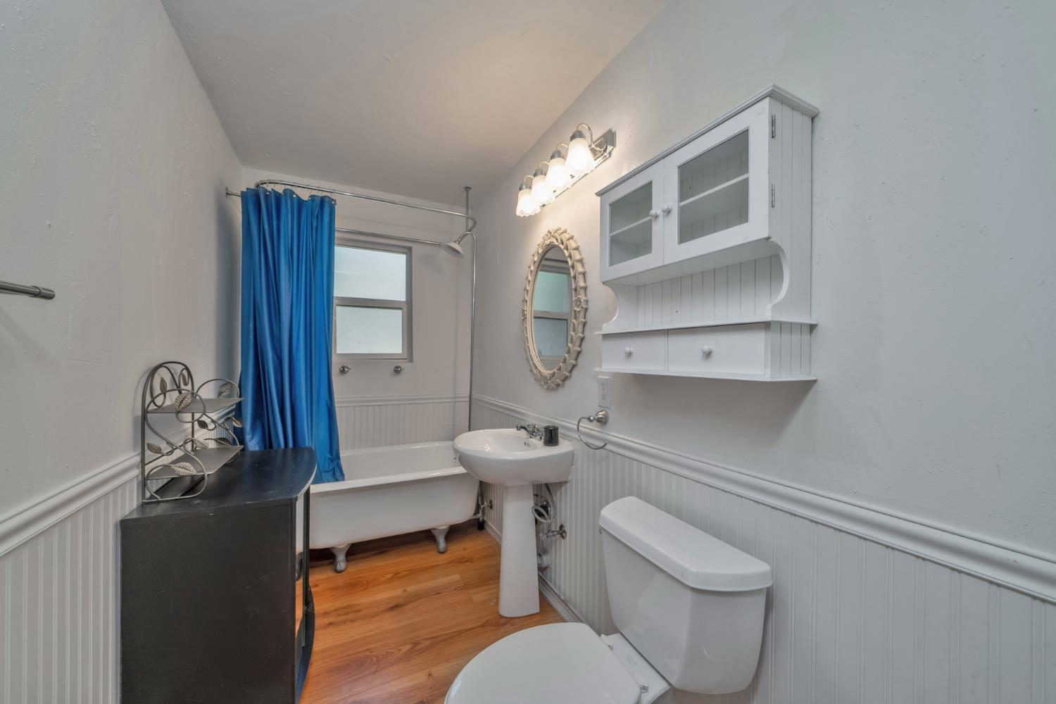 1334 School Road Kyburz, CA 95720 - Photo 15 of 36 a bathroom with a toilet a sink and mirror