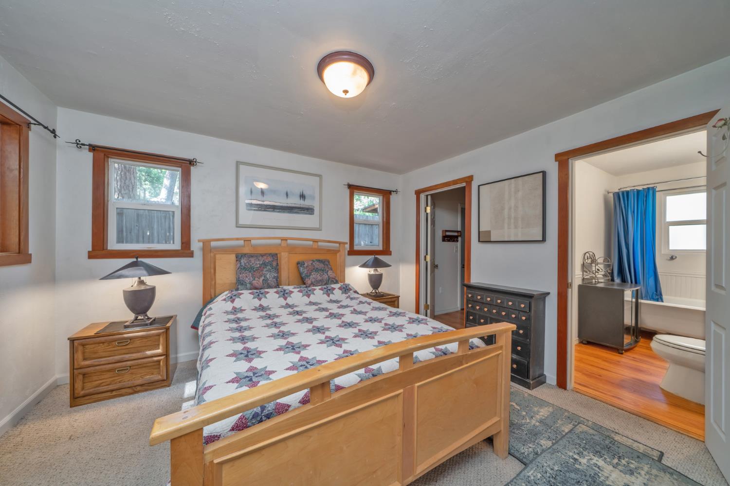 1334 School Road Kyburz, CA 95720 - Photo 16 of 36 a bedroom with a bed and a dresser