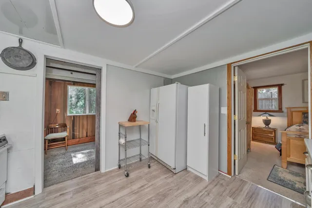a view of livingroom with furniture and wooden floor