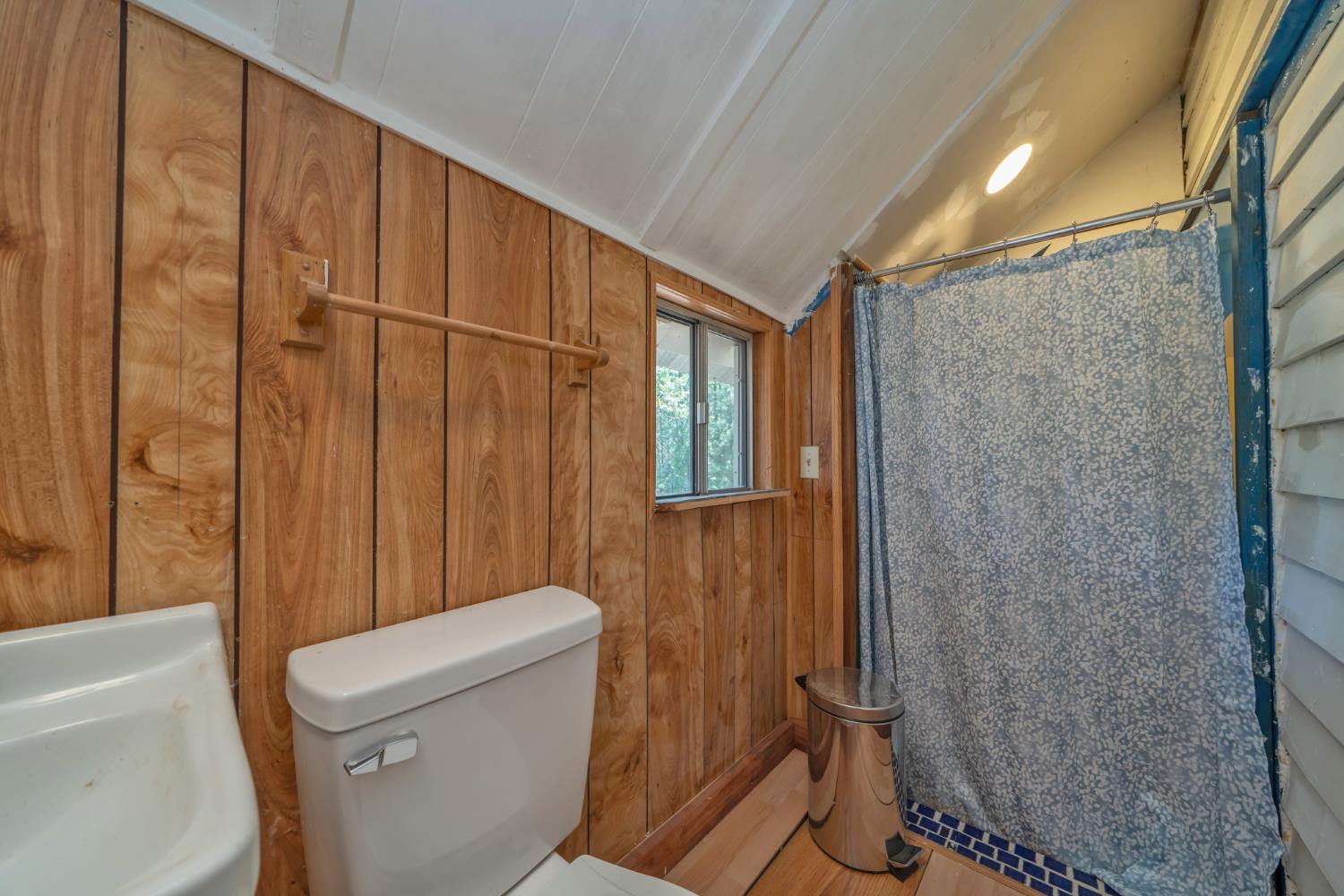 1334 School Road Kyburz, CA 95720 - Photo 20 of 36 a bathroom with a toilet and shower
