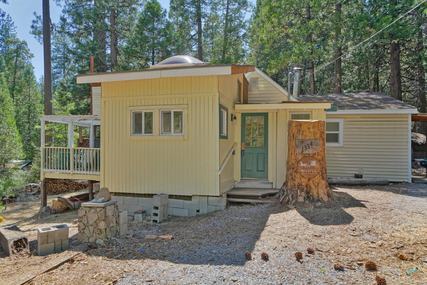 1334 School Road Kyburz, CA 95720 - Photo 25 of 36 a front view of a house with garden