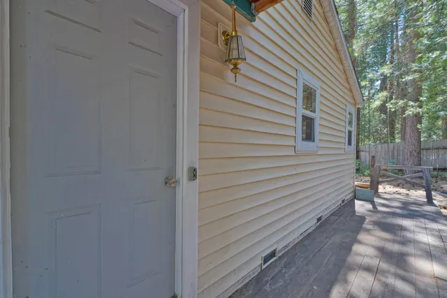 a view of a back yard of the house