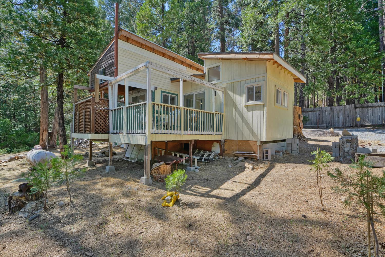 1334 School Road Kyburz, CA 95720 - Photo 5 of 36 a view of a house with patio