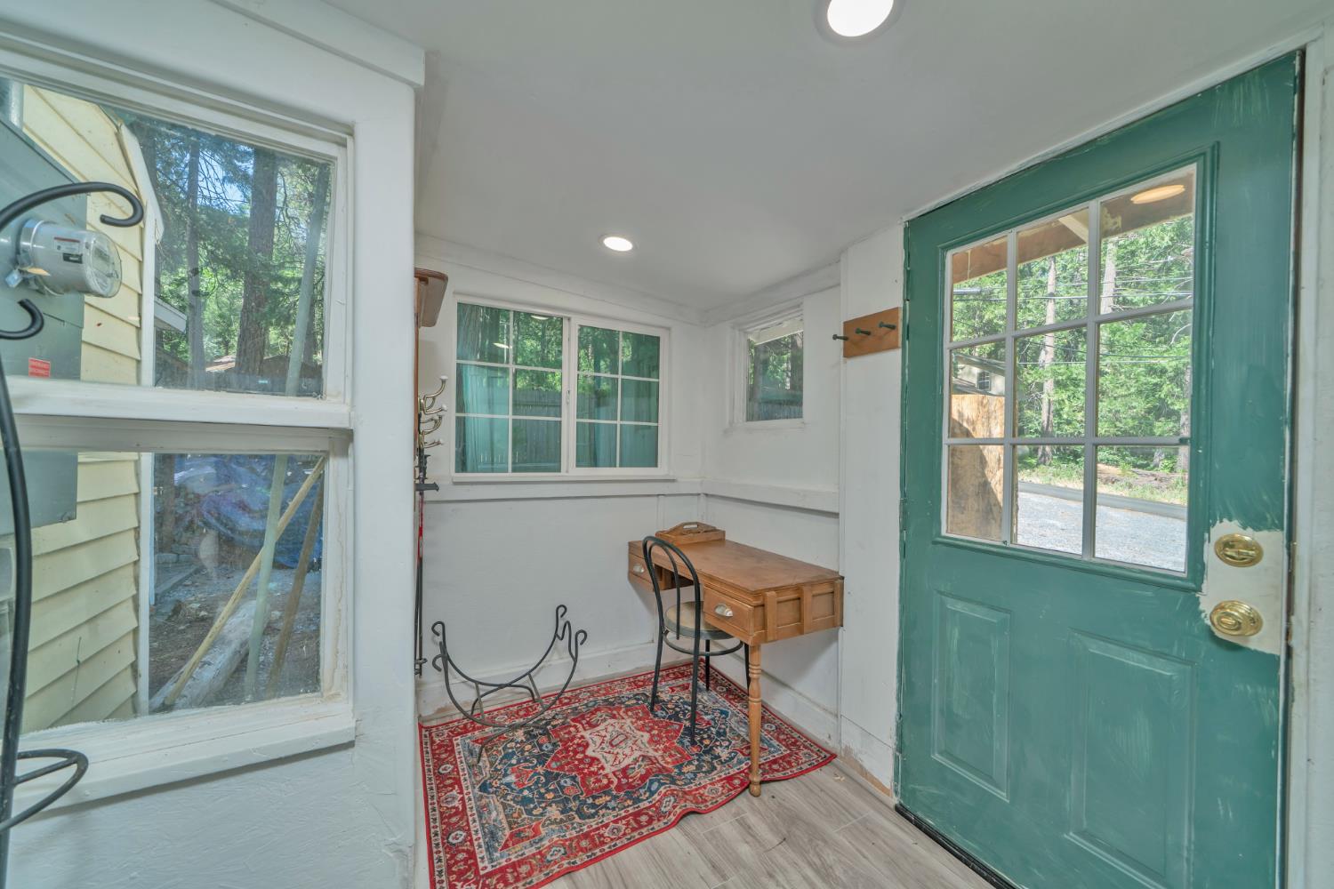 1334 School Road Kyburz, CA 95720 - Photo 10 of 36 a living room with furniture and a window