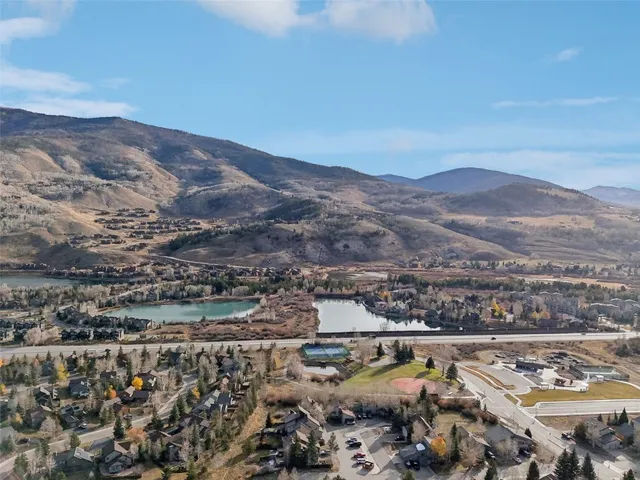an aerial view of a house with outdoor space