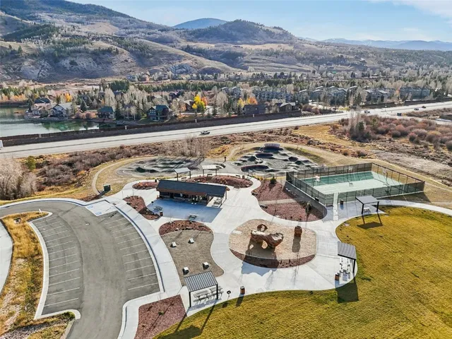 an aerial view of a swimming pool with outdoor space