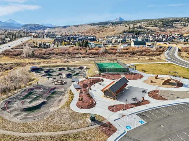 an aerial view of a swimming pool and outdoor space
