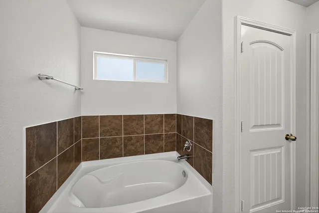 a bathroom with a bathtub