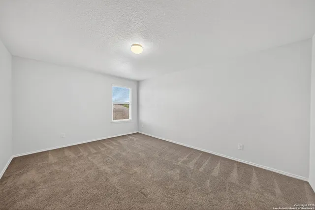 an empty room with a natural light