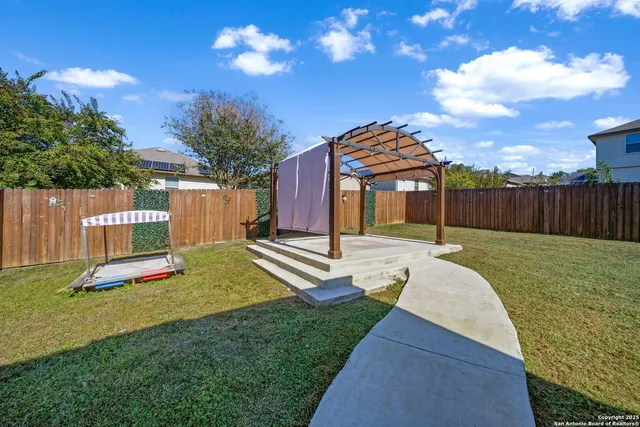 a view of a garden with a slide