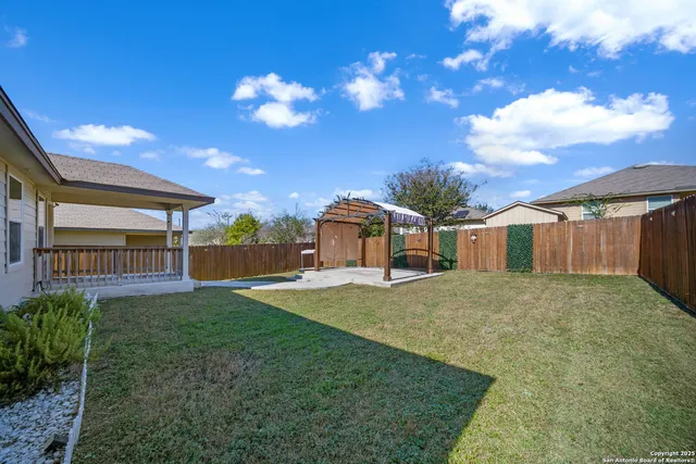 a house view with a garden space