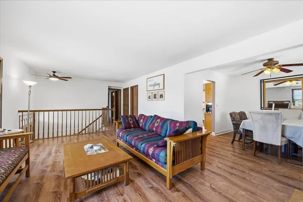 a living room with furniture and a table