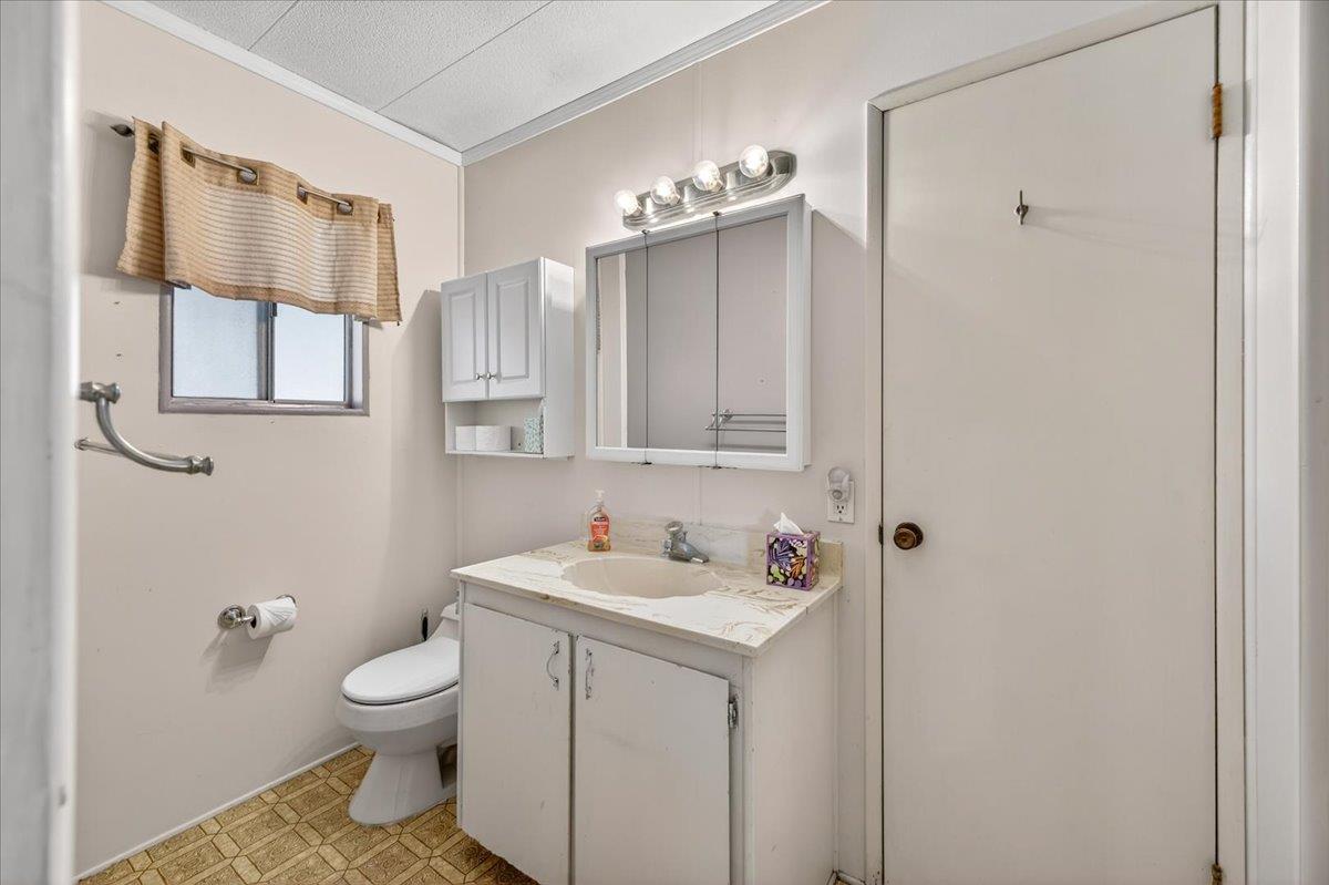 2706 West Ashlan Avenue, Unit 86 Fresno, CA 93705 - Photo 26 of 61 a bathroom with a sink toilet and shower