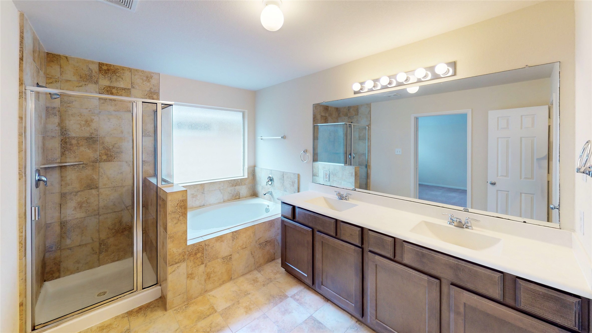 6351 Wilshire Ridge Houston, TX 77040 - Photo 13 of 24 a bathroom with a double vanity sink mirror and shower
