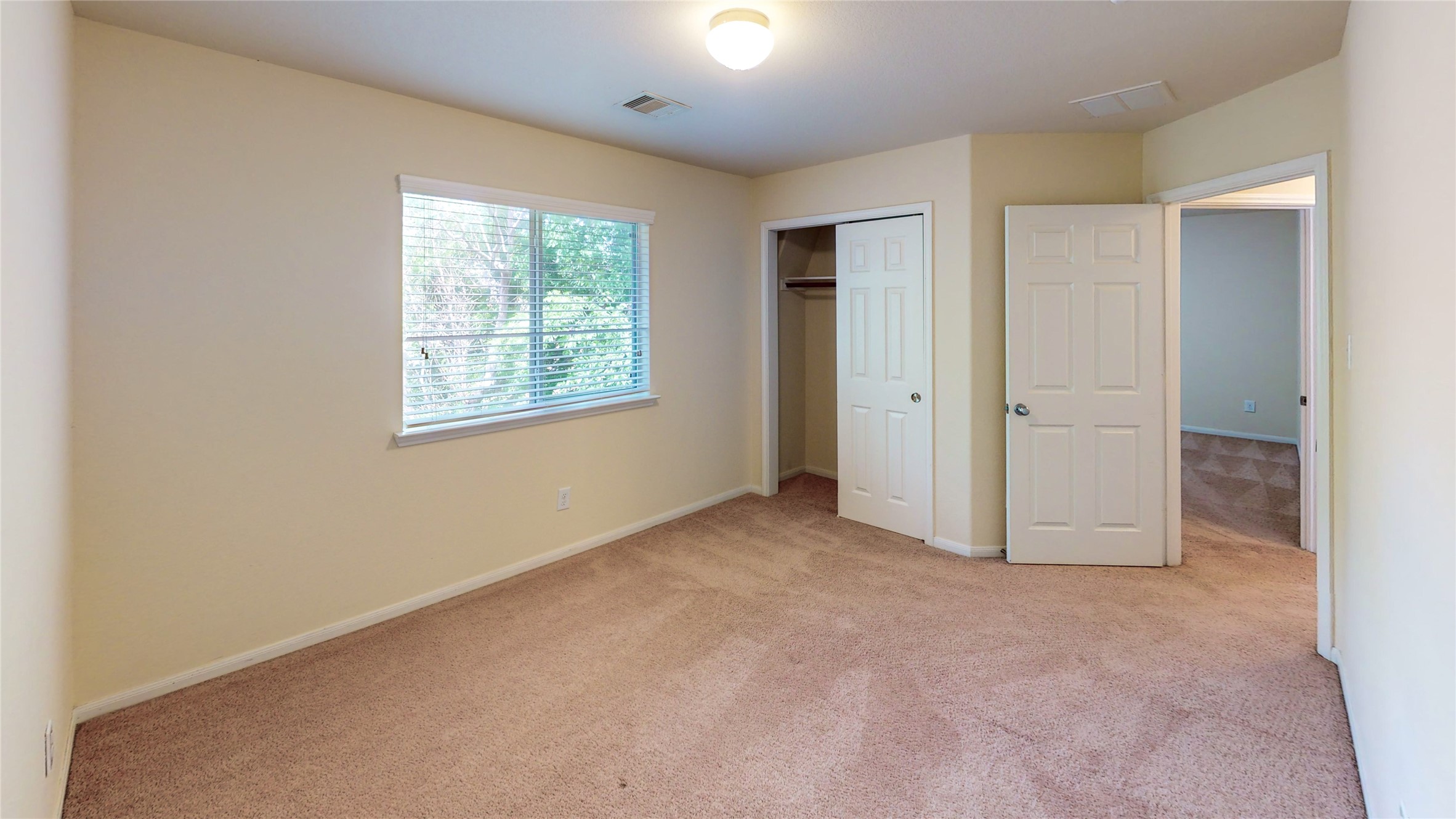 6351 Wilshire Ridge Houston, TX 77040 - Photo 17 of 24 an empty room with windows