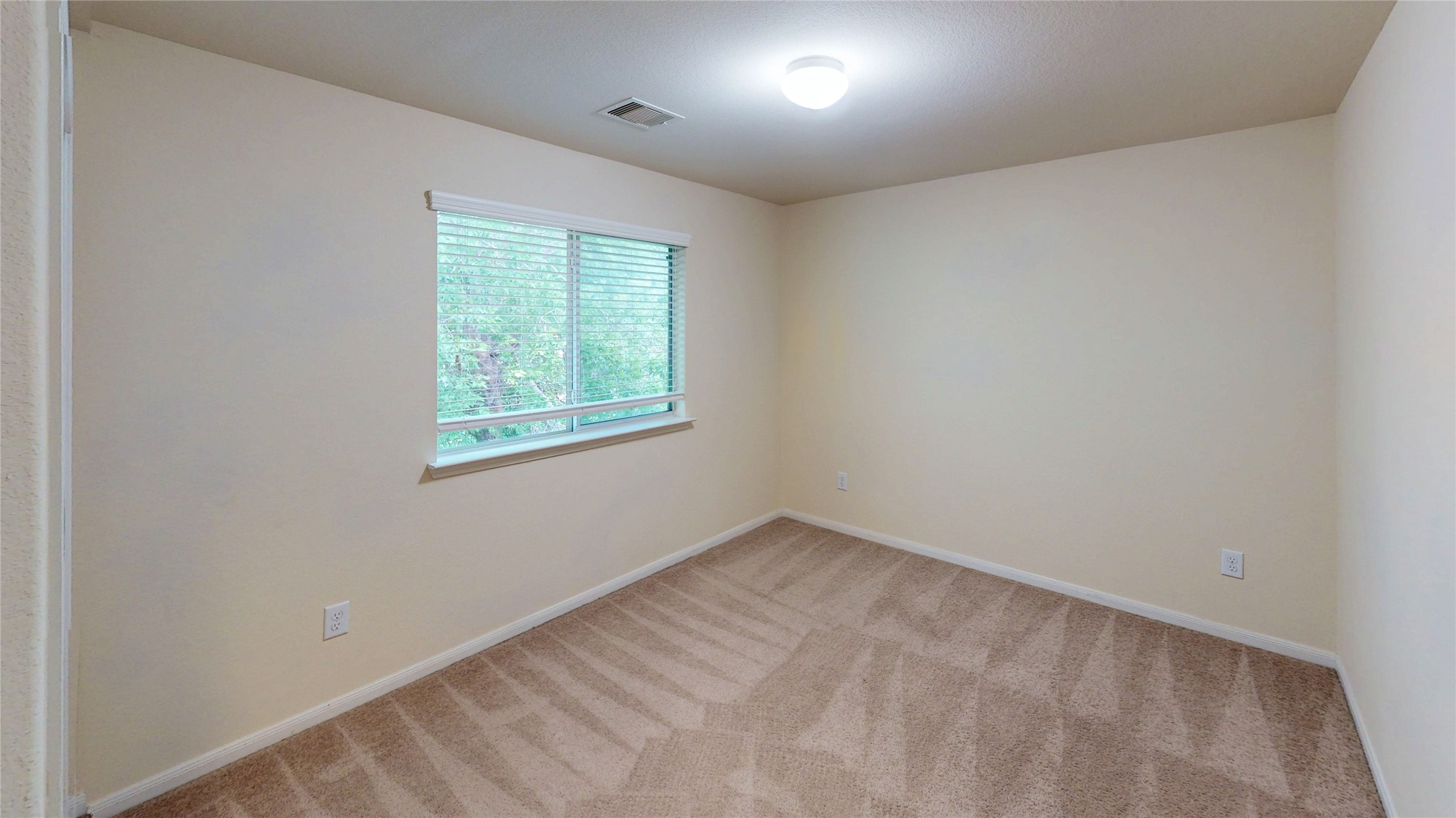 6351 Wilshire Ridge Houston, TX 77040 - Photo 19 of 24 an empty room with windows