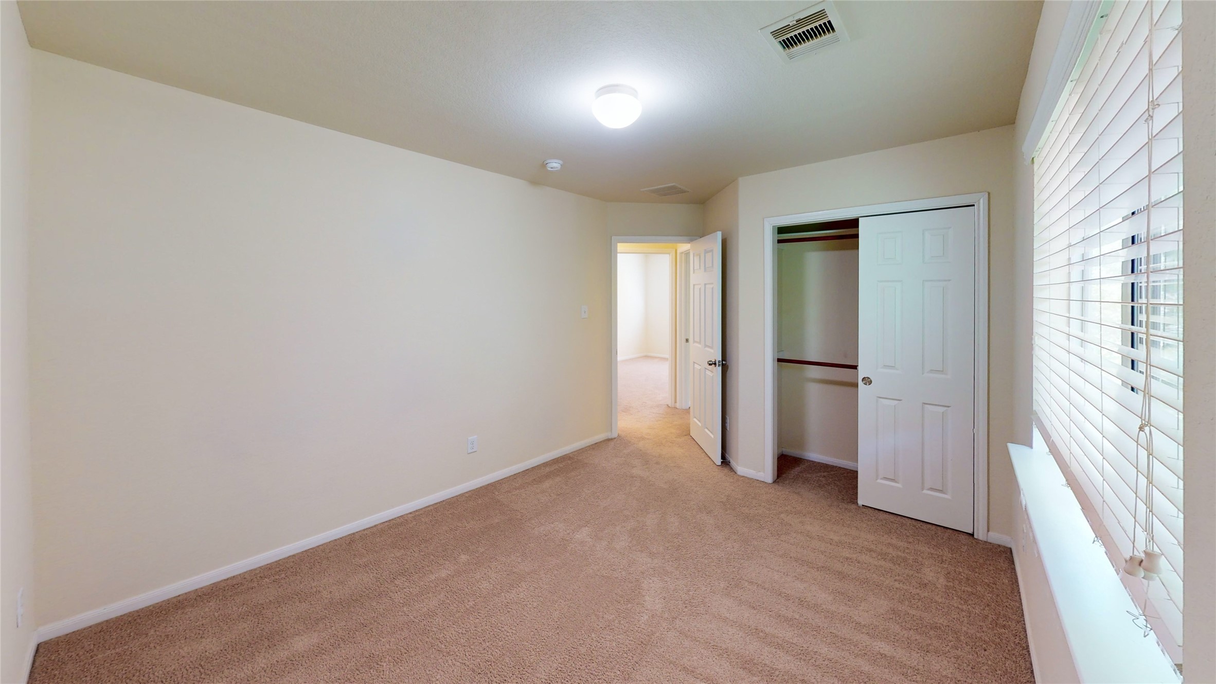 6351 Wilshire Ridge Houston, TX 77040 - Photo 20 of 24 an empty room with windows and closet