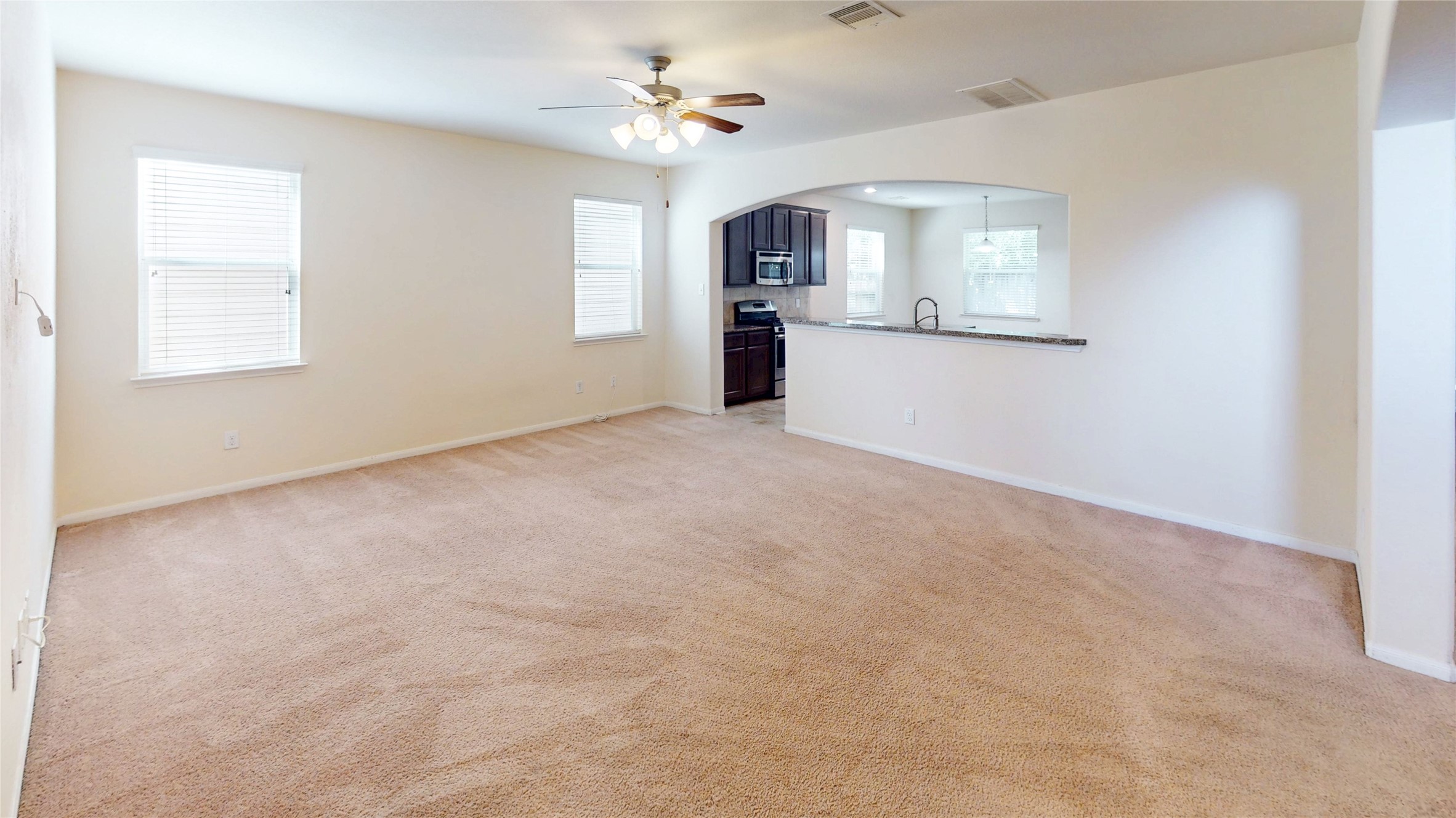 6351 Wilshire Ridge Houston, TX 77040 - Photo 2 of 24 a view of an empty room with a window