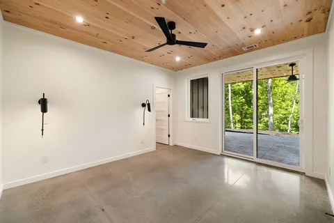 a bed room with a bed and a couch