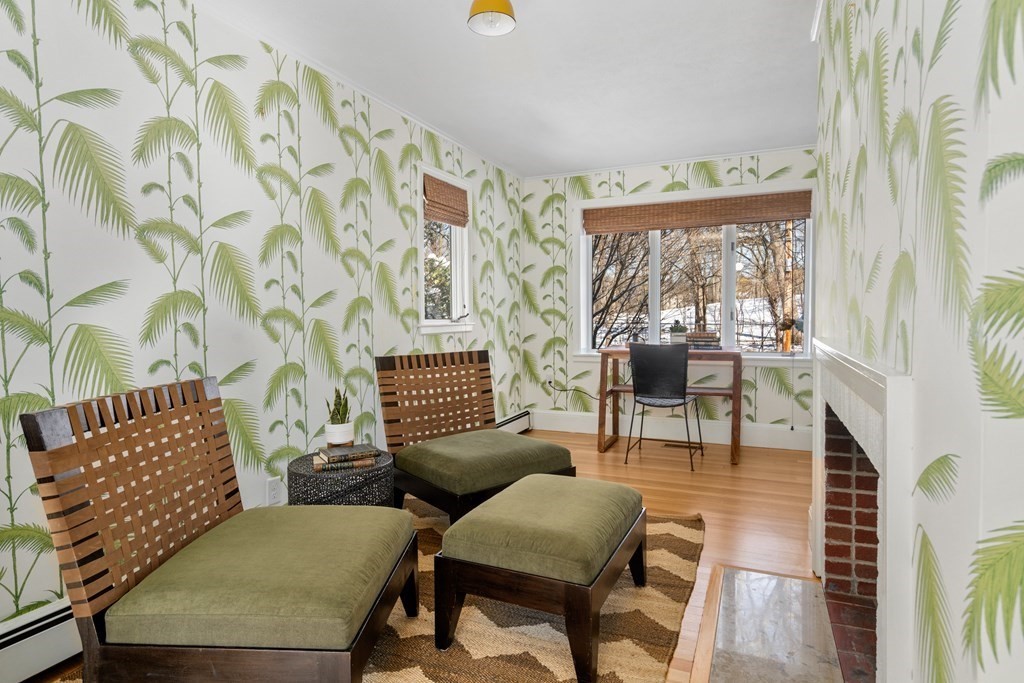 84 Moffat Road Newton, MA 02468 - Photo 12 of 39 a living room with furniture and a floor to ceiling window