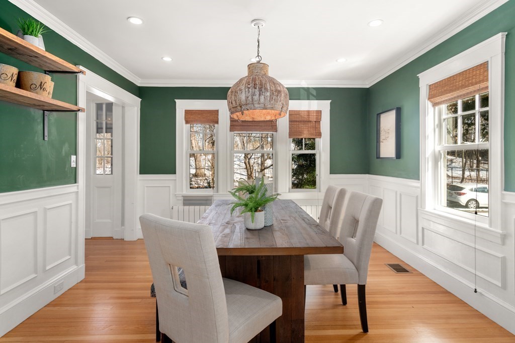 84 Moffat Road Newton, MA 02468 - Photo 14 of 39 a view of a dining room with furniture window and wooden floor
