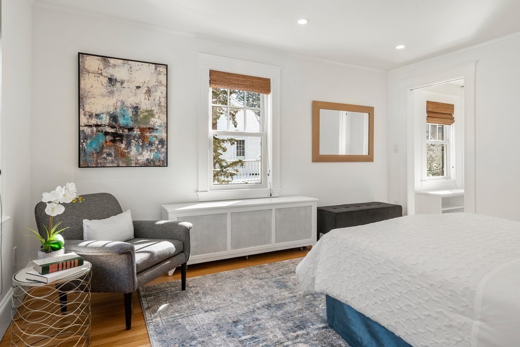 84 Moffat Road Newton, MA 02468 - Photo 22 of 39 a bedroom with a bed and wooden furniture