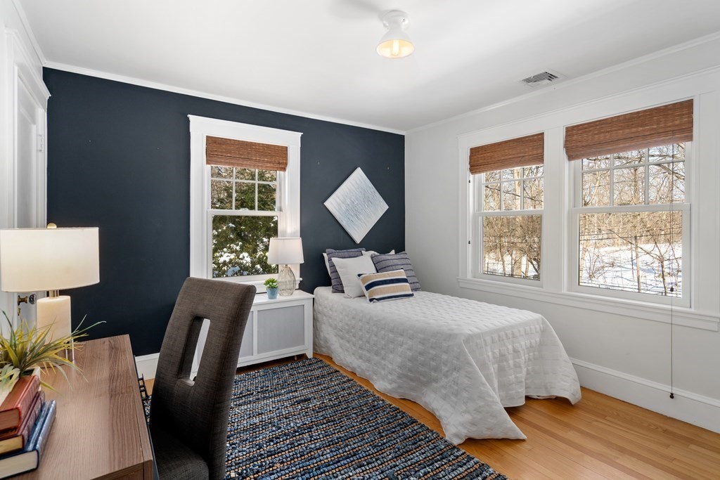 84 Moffat Road Newton, MA 02468 - Photo 27 of 39 a bedroom with a bed wooden floor and window
