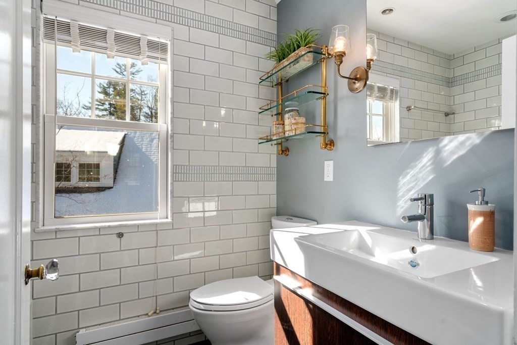 84 Moffat Road Newton, MA 02468 - Photo 28 of 39 a bathroom with a sink a toilet and shower