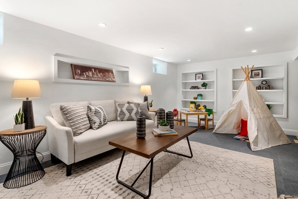 84 Moffat Road Newton, MA 02468 - Photo 31 of 39 a living room with furniture and a lamp