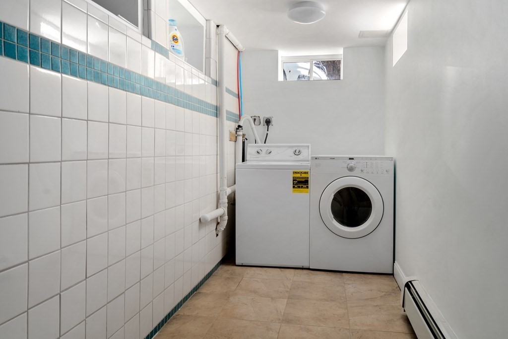 84 Moffat Road Newton, MA 02468 - Photo 32 of 39 a utility room with dryer and washer