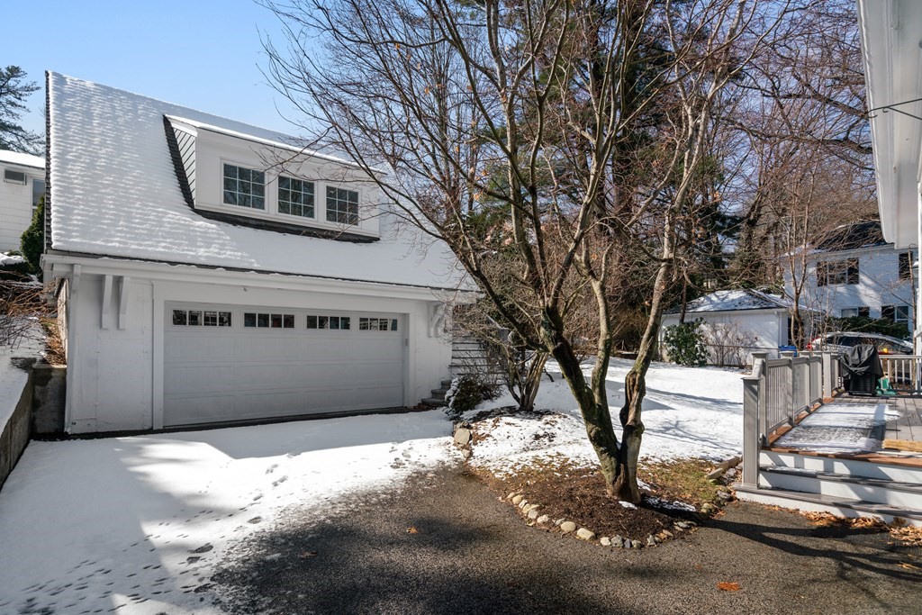 84 Moffat Road Newton, MA 02468 - Photo 34 of 39 a front view of a house with a yard