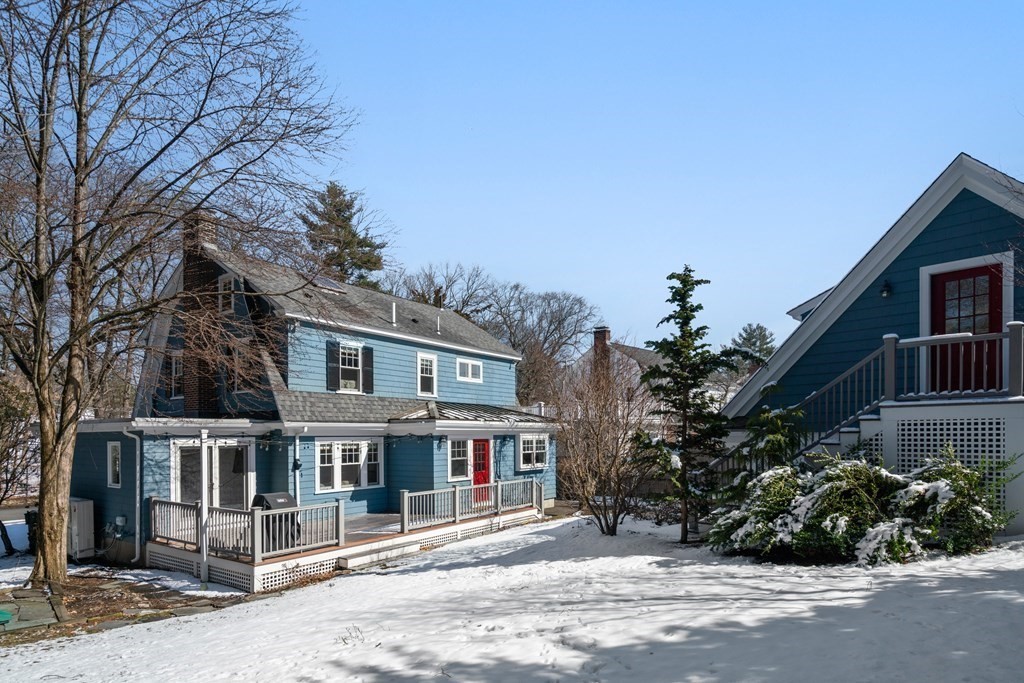 84 Moffat Road Newton, MA 02468 - Photo 38 of 39 a front view of a house with a garden